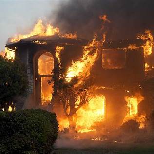 Residential house on fire from bushfire embers in WA